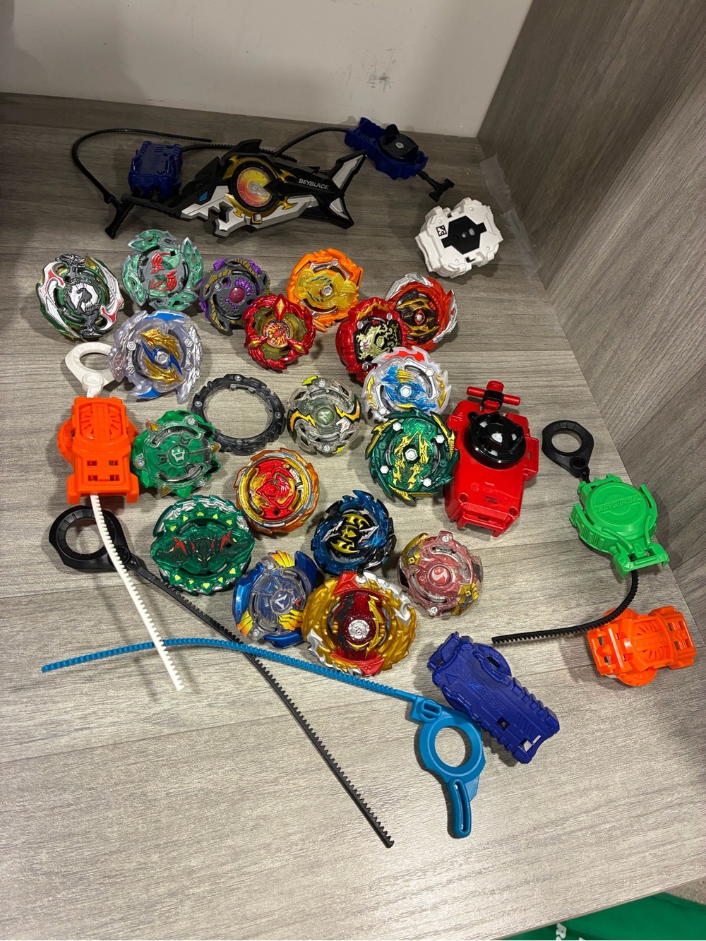 Beyblades Lot of 18 plus Launchers. As is.
